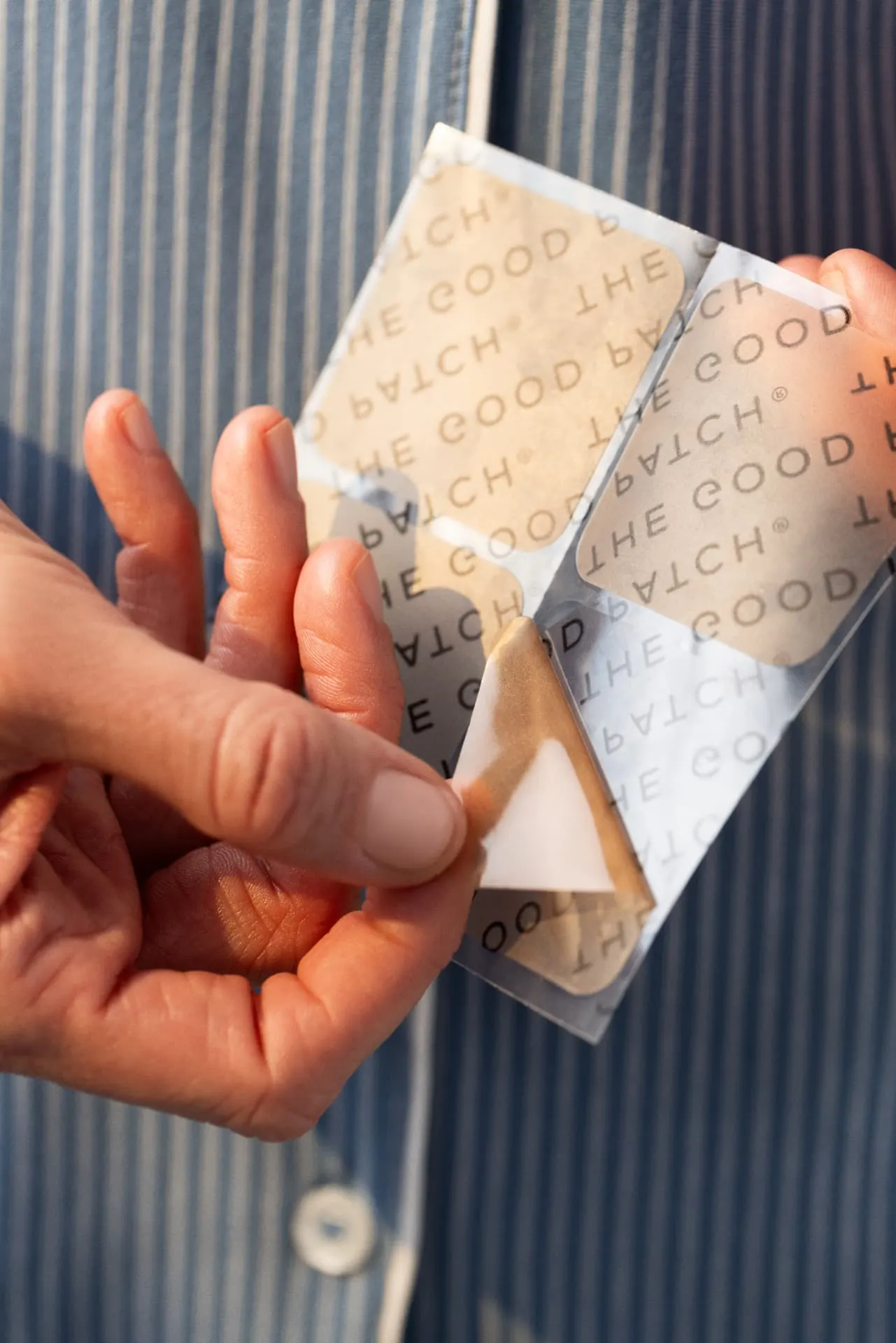 Peeling a Rescue patch from its backing